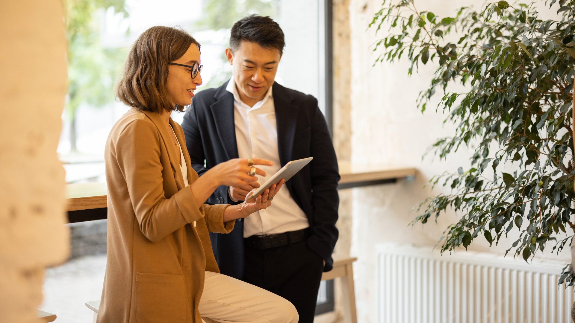 image of man and woman talking at work